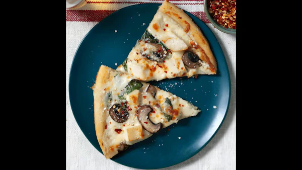 Photo of 10" Chicken Mushroom Red Onion Alfredo Sauce Pizza