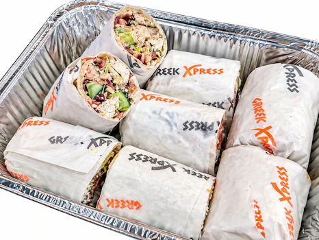 Photo of Half Tray of Grilled Chicken Greek Salad Wraps