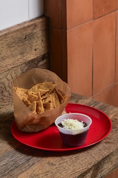Photo of Tray of Refried Beans and Chips