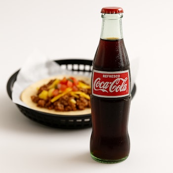 Photo of Dozen of Coca Cola Bottles