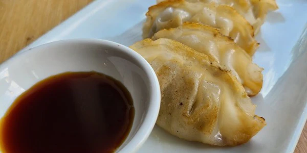 Photo of Pan Fried Pork & Chicken Gyoza Dumplings Tray