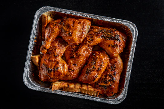 Photo of Tray of Fire-Grilled Chicken Thighs