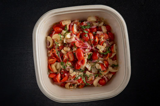 Photo of Tray of Tomato & Palm Hearts Salad