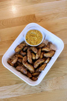 Photo of Tray of Roasted Potatoes & Sauce