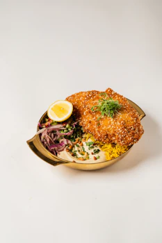Photo of Crispy Chicken Schnitzel Bowl