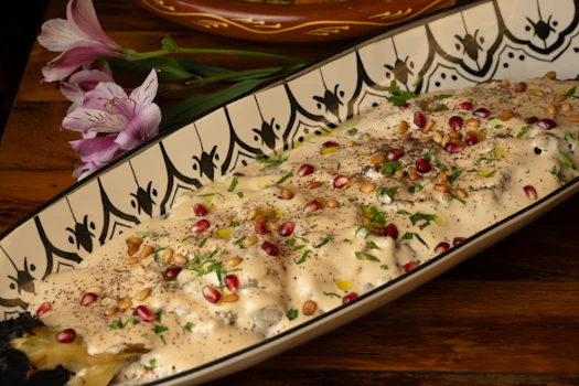 Photo of Half Tray of Whole Charred Eggplant