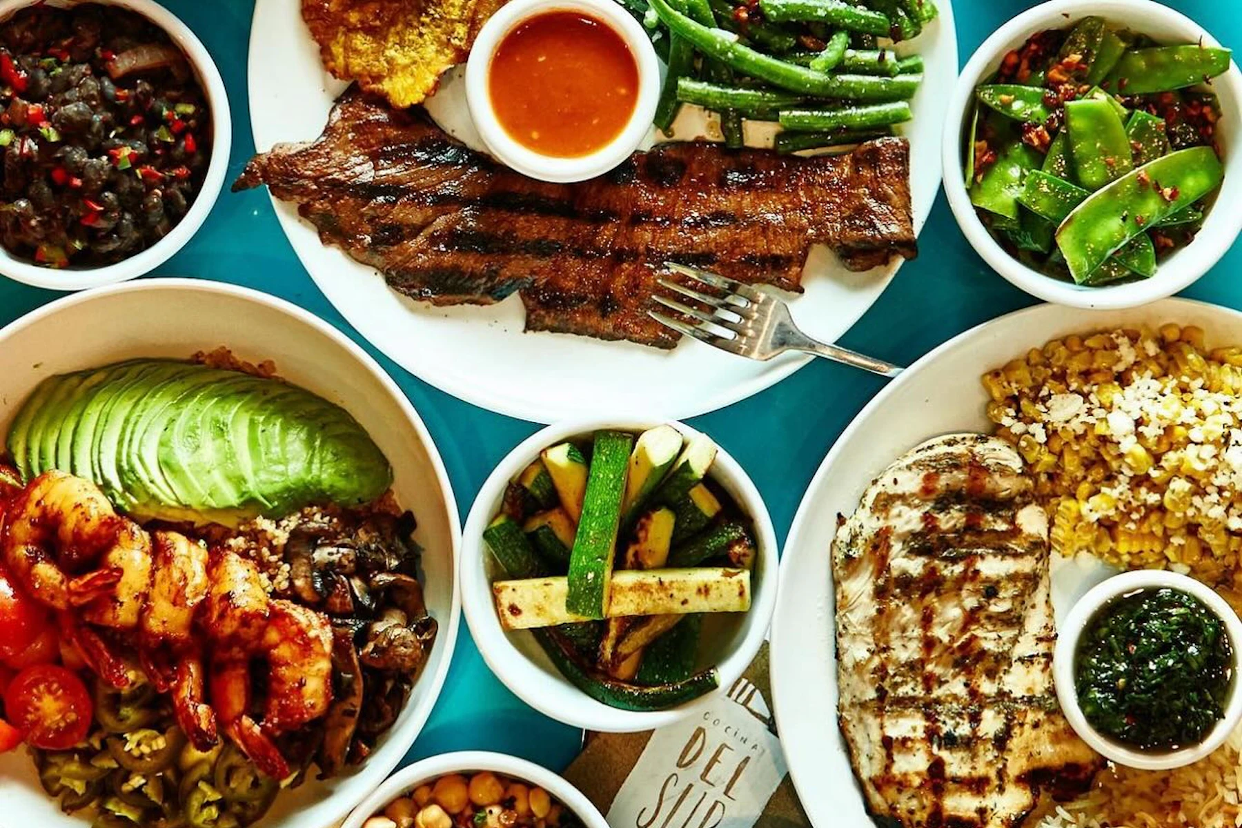Cocina Del Sur Corporate Catering and Group Ordering located in New York City. Cocina Del Sur's top menu items include Small Tray of Black Beans, Small Tray of Roasted Seasonal Veggies, Small Tray of Vegan House Salad.