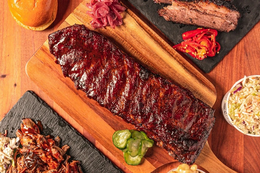 Mighty Quinn's Barbeque Corporate Catering and Group Ordering located in New York City. Mighty Quinn's Barbeque's top menu items include Half Tray of Mac & Cheese, Half Tray of Brussel Sprouts, Half Tray of Brownies & Blondies.