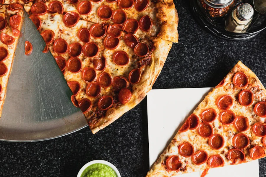 Two Boots Brooklyn Corporate Catering and Group Ordering located at 284 5th Ave, Brooklyn, NY 11215, USA. Two Boots Brooklyn's top menu items include Tray of Caesar Salad with Caesar Dressing, Tray of House Salad with Balsamic Vinaigrette, Dozen of Garlic Knots.