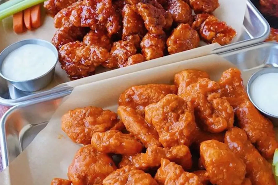 Buffalo Wild Wings Corporate Catering and Group Ordering located at 455 Park Ave S, New York, NY 10016, USA. Buffalo Wild Wings's top menu items include Ten-Piece Traditional Wings, Regular Side of French Fries, Catering Size Order of Carrots.
