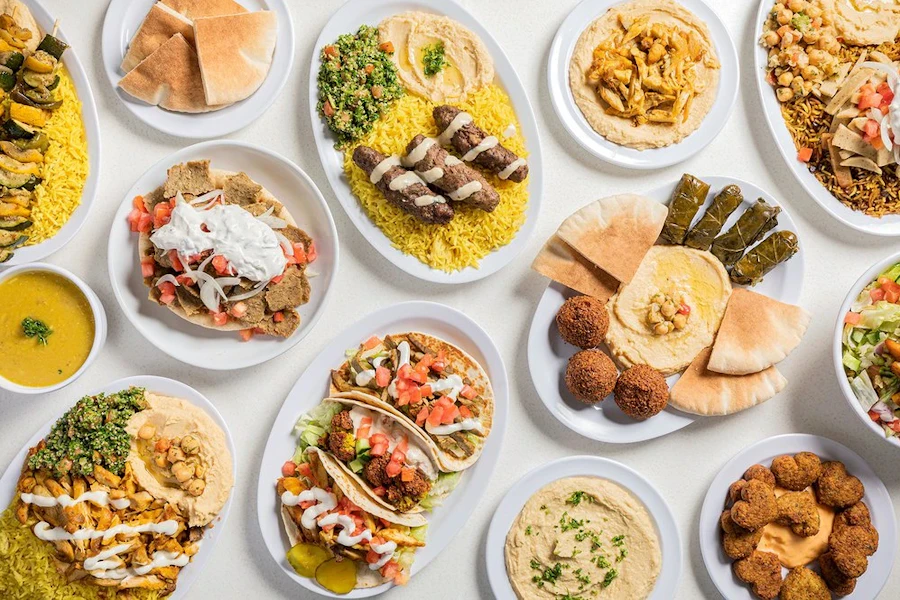 Oasis Fresh Corporate Catering and Group Ordering located at 500 W Diversey Pkwy, Chicago, IL 60614, USA. Oasis Fresh's top menu items include Half Tray of Falafel, Half Tray of Baba Ghanouj, Half Tray of Hummus.