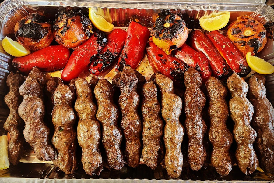 Shawarmaniac Corporate Catering and Group Ordering located at 11510 124th Ave NE, Kirkland, WA 98033, USA. Shawarmaniac's top menu items include Small Chicken Shawarma Plate, Lamb & Beef Wrap Combo Meal, Small Chicken Kabob Plate.