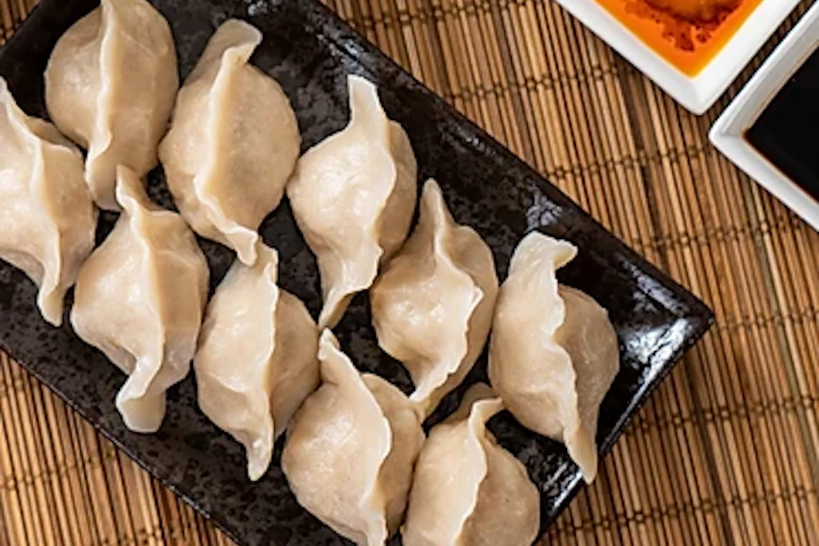 Dumpling Capital Corporate Catering and Group Ordering located at 5075 Stevens Creek Blvd #10, Santa Clara, CA 95051, USA. Dumpling Capital's top menu items include Half Tray of Broccoli Beef, Half Tray of White Rice, Half Tray of Vegetable Chow Mein.
