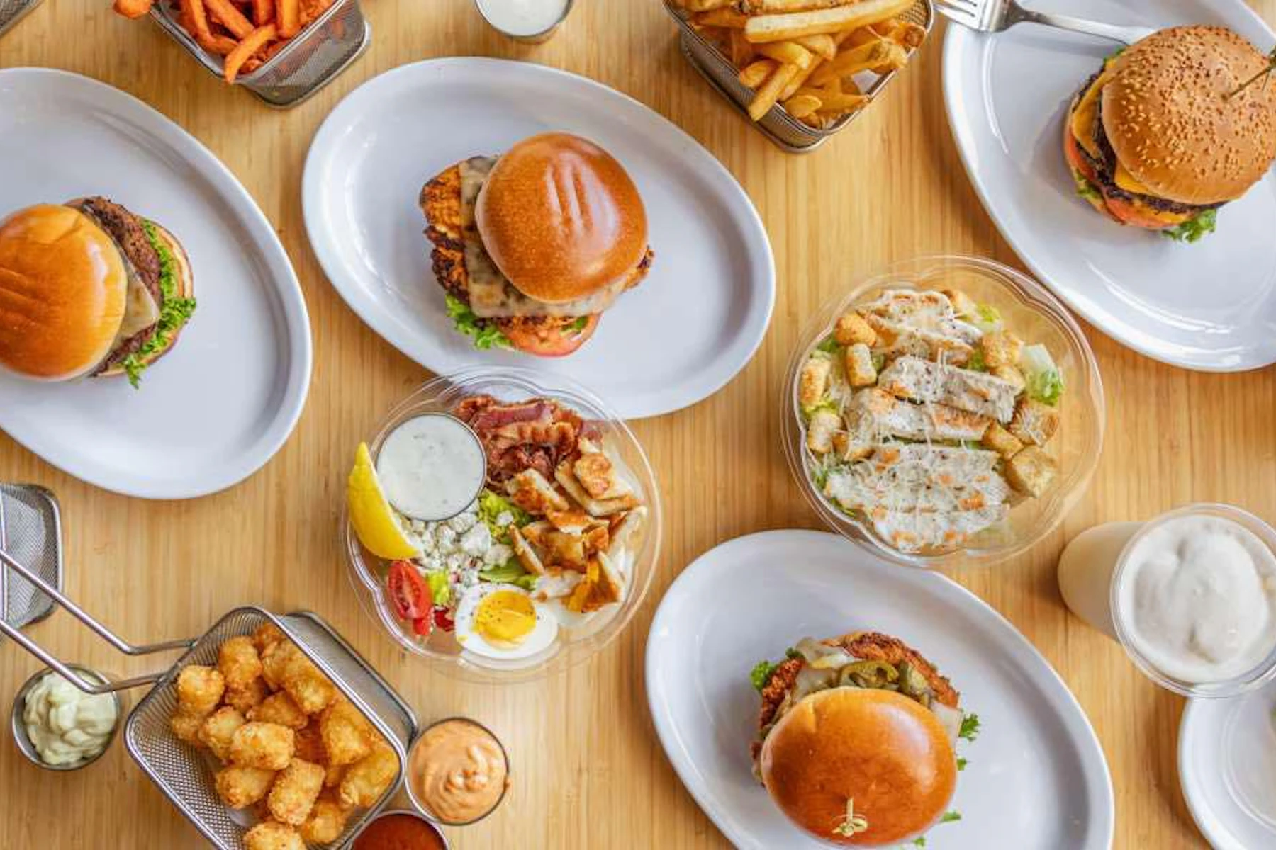 206 Burger Company Corporate Catering and Group Ordering located at 1401 Broadway, Seattle, WA 98122, USA. 206 Burger Company's top menu items include Combo Meal, Cali Cobb Salad, Tray of Sweet Potato Fries.