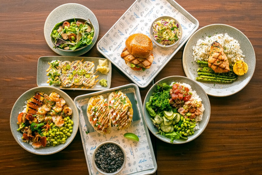 Pacific Catch Corporate Catering and Group Ordering located at 133 Corte Madera Town Center, Corte Madera, CA 94925, USA. Pacific Catch's top menu items include Lunch-Size Hawaiian Teriyaki Chicken Bowl, Lunch-Size West Coast-Style Grilled Salmon Bowl, Wagyu Cheeseburger.