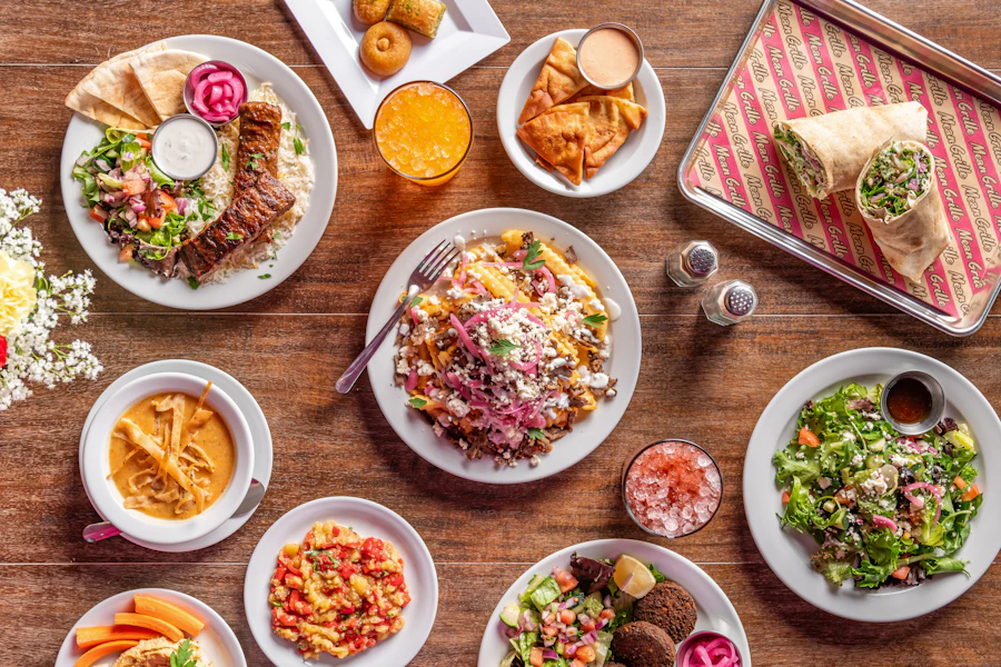 Mean Grille Corporate Catering and Group Ordering located at 3995 Richmond Ave., Houston, TX 77027, USA. Mean Grille's top menu items include Chicken Kebab Plate, Beef & Lamb Mix Plate, Chicken Wrap Lunch Box.