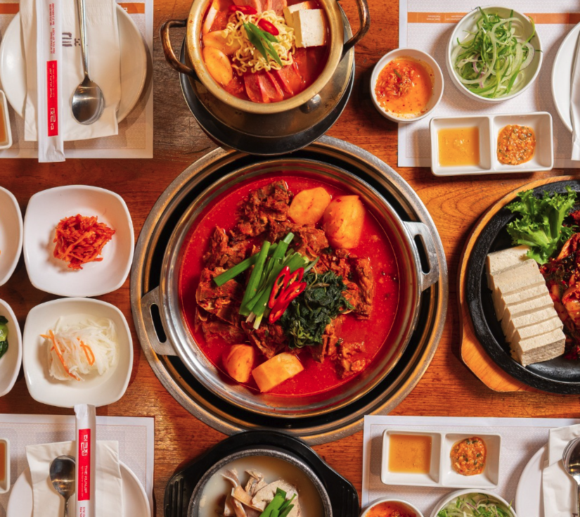 The Kunjip Corporate Catering and Group Ordering located at 32 W 32nd St, New York, NY 10001, USA. The Kunjip's top menu items include Beef Bulgogi Dosirak, Sweet & Spicy Chicken Dosirak, Bulgogi Bibimbap.