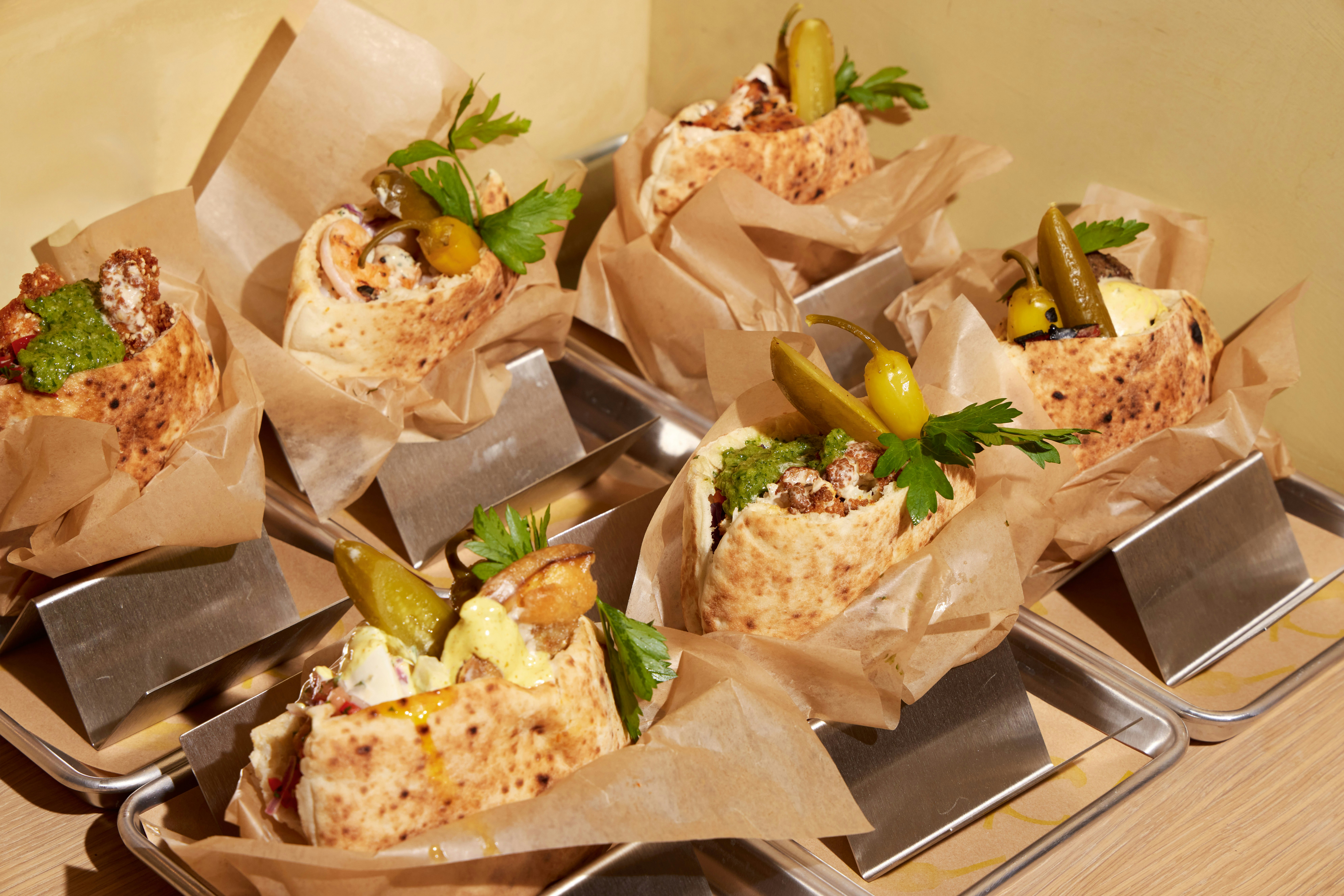 Shifka Corporate Catering and Group Ordering located at 324 Bowery, New York, NY 10012, USA. Shifka's top menu items include Catering Size Order of Babaganoush Dip, Catering Size Order of Labneh Dip, Tray of Za'atar Fries.