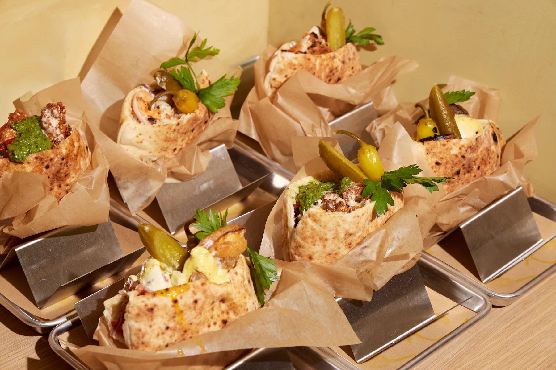 Shifka Corporate Catering and Group Ordering located at 324 Bowery, New York, NY 10012, USA. Shifka's top menu items include Harissa Chicken, Lamb Kebab, Shifka Bar.