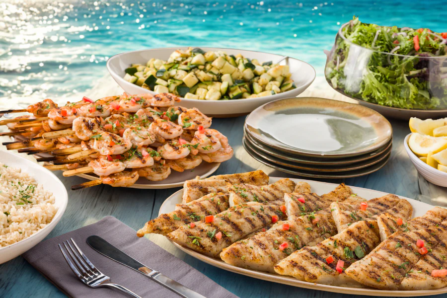 California Fish Grill Corporate Catering and Group Ordering located at 11048 Main St, Fairfax, VA 22030, USA. California Fish Grill's top menu items include Salmon & Swai Combo Plate, Wild Rockfish Plate, Shrimp & Avocado Caesar Salad.