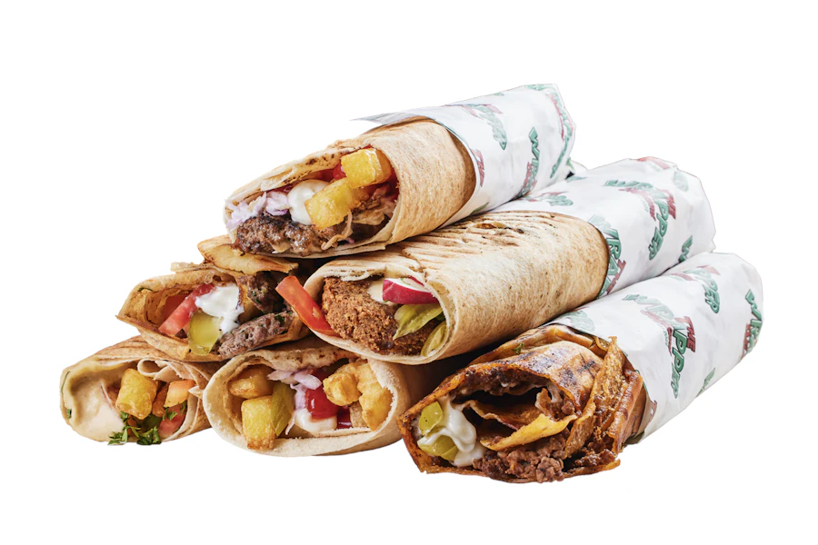 The Wrapper Miami Corporate Catering and Group Ordering located at 6974 Collins Ave, Miami Beach, FL 33141, USA. The Wrapper Miami's top menu items include 11" Lebanese Burger Wrap, 11" Chicken Wrap, Chicken Bowl.