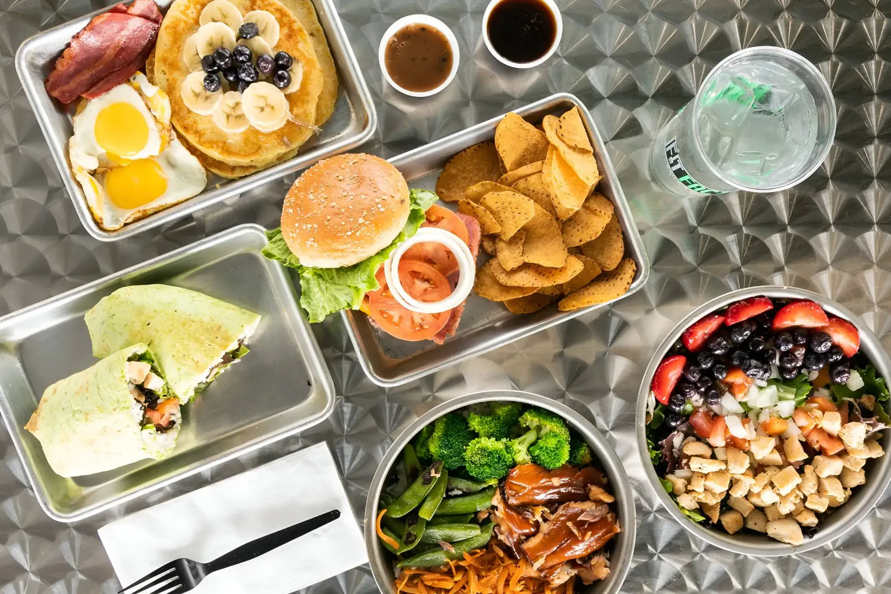Fit Factory Grill Corporate Catering and Group Ordering located at 2021 N Town E Blvd, Mesquite, TX 75150, USA. Fit Factory Grill's top menu items include Lean - Regular Portion - Bison Burger, Lean - Regular Portion - Fiesta Bowl, Lean - Regular Portion - Teriyaki Bowl.