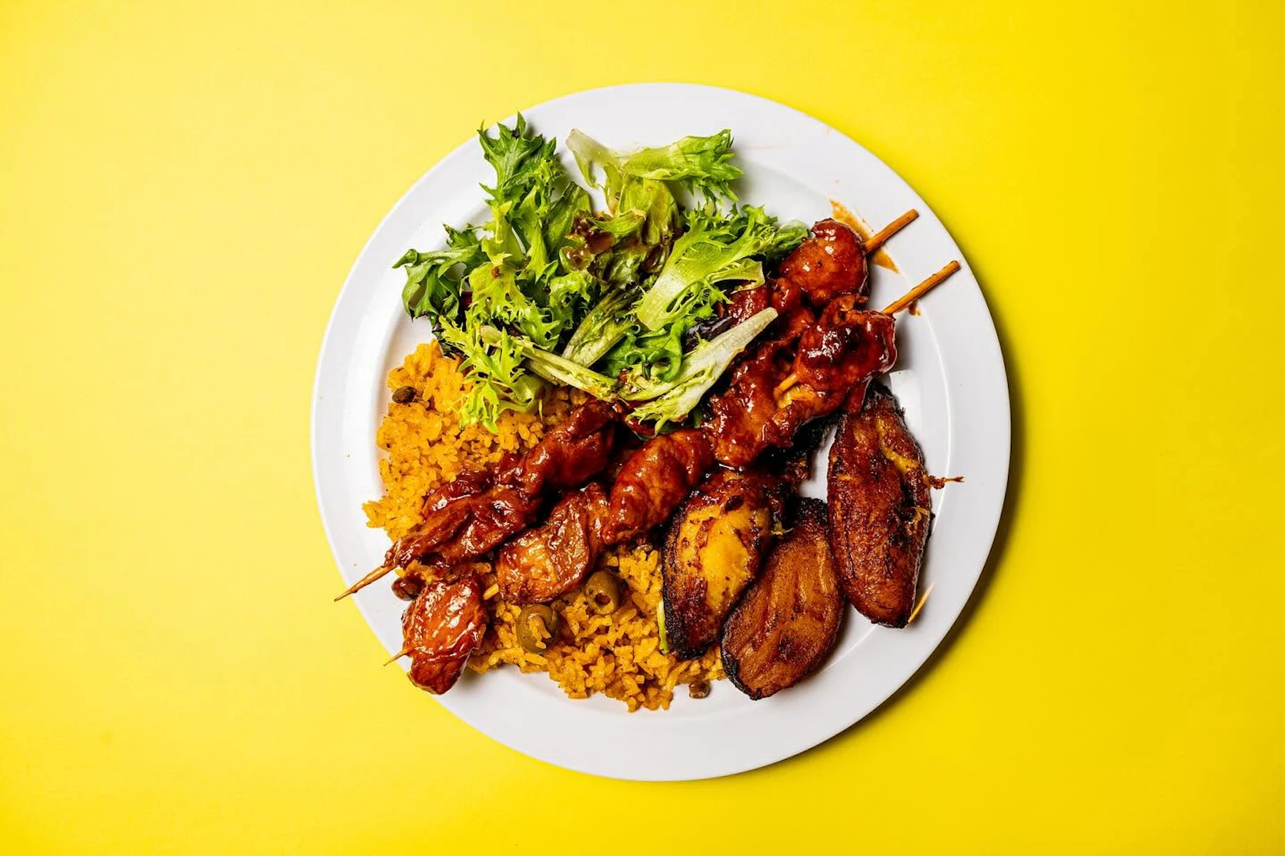 Casa Borinquena Corporate Catering and Group Ordering located at 2557 Amber St, Philadelphia, PA 19125, USA. Casa Borinquena's top menu items include Sampler A, Tray of Arroz Con Gandules, Tray of Chicken & Onions.
