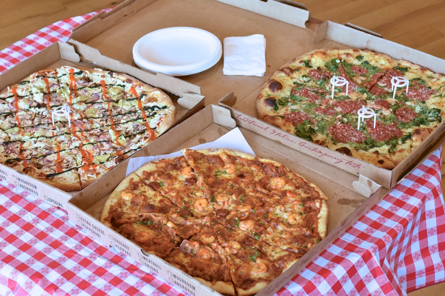 Two Boots Brooklyn Corporate Catering and Group Ordering located at 284 5th Ave, Brooklyn, NY 11215, USA. Two Boots Brooklyn's top menu items include Tray of Caesar Salad with Caesar Dressing, Tray of House Salad with Balsamic Vinaigrette, Dozen of Garlic Knots.