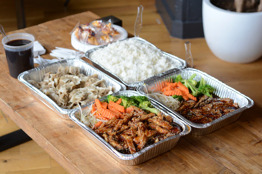 Bento Woman Corporate Catering and Group Ordering located at 1500 S Western Ave, Los Angeles, CA 90006, USA. Bento Woman's top menu items include Bento Box - Gluten-Free Grilled Salmon, Chicken Yakisoba, Half Tray of Gyoza.
