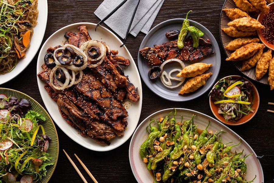 PERILLA Fare Corporate Catering and Group Ordering located at 401 N Milwaukee Ave, Chicago, IL 60654, USA. PERILLA Fare's top menu items include Tray of Korean Scallion Pancakes, Half Tray of Fried Vegetable Dumplings, Half Tray of Scallion Pancakes.