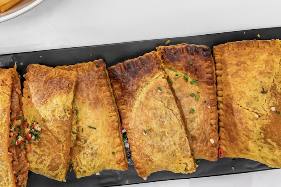 Tosh's Patties Corporate Catering and Group Ordering located at 2373 Adam Clayton Powell Jr Blvd, New York, NY 10030, USA.