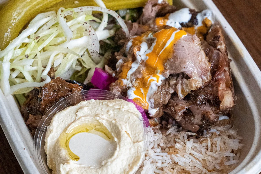 Hen House NYC Corporate Catering and Group Ordering located at 120 1st Ave, New York, NY 10009, USA. Hen House NYC's top menu items include Shish Taouk Chicken Platter with Batata Harra, Shish Taouk Chicken Platter with Crispy Garlic Rice, The Viral Hen House Piri Piri Fried Chicken Sandwich.